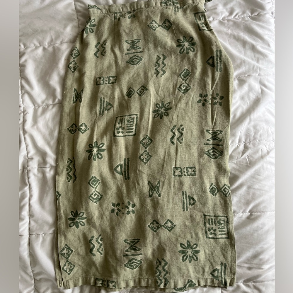 Cute Green skirt with shaped patterns. Like new. Not stretchable Liz Baker Brand